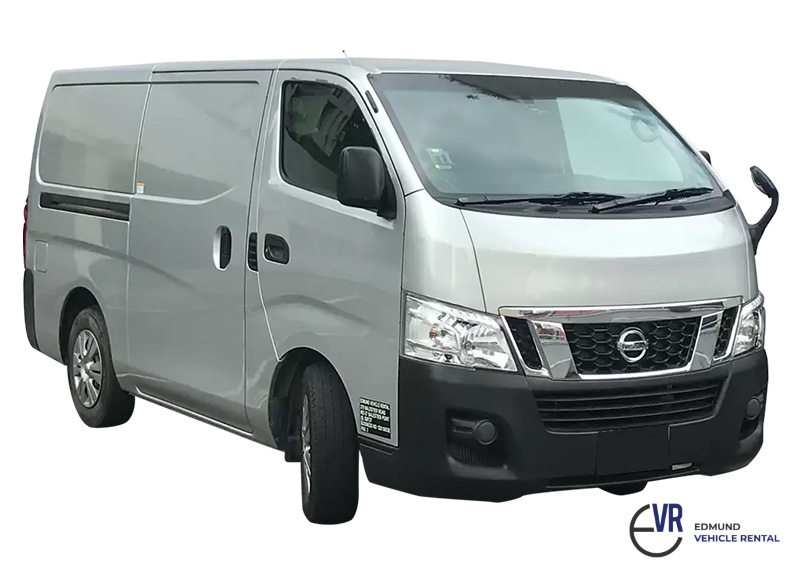 A white van with Chinese New Year decoration in the background.